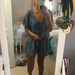 Cut out shoulder, open back romper